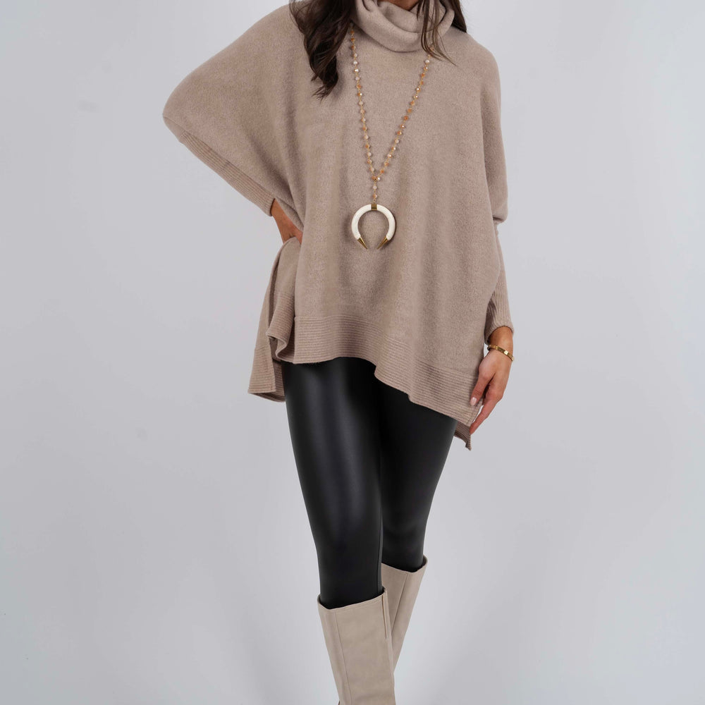 
                      
                        Tell Me Why Tunic (Taupe)
                      
                    