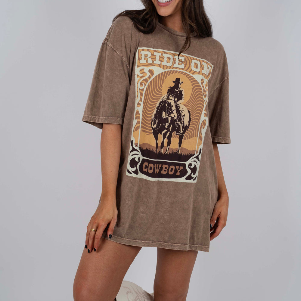 
                      
                        Ride On Cowboy Graphic Tee
                      
                    