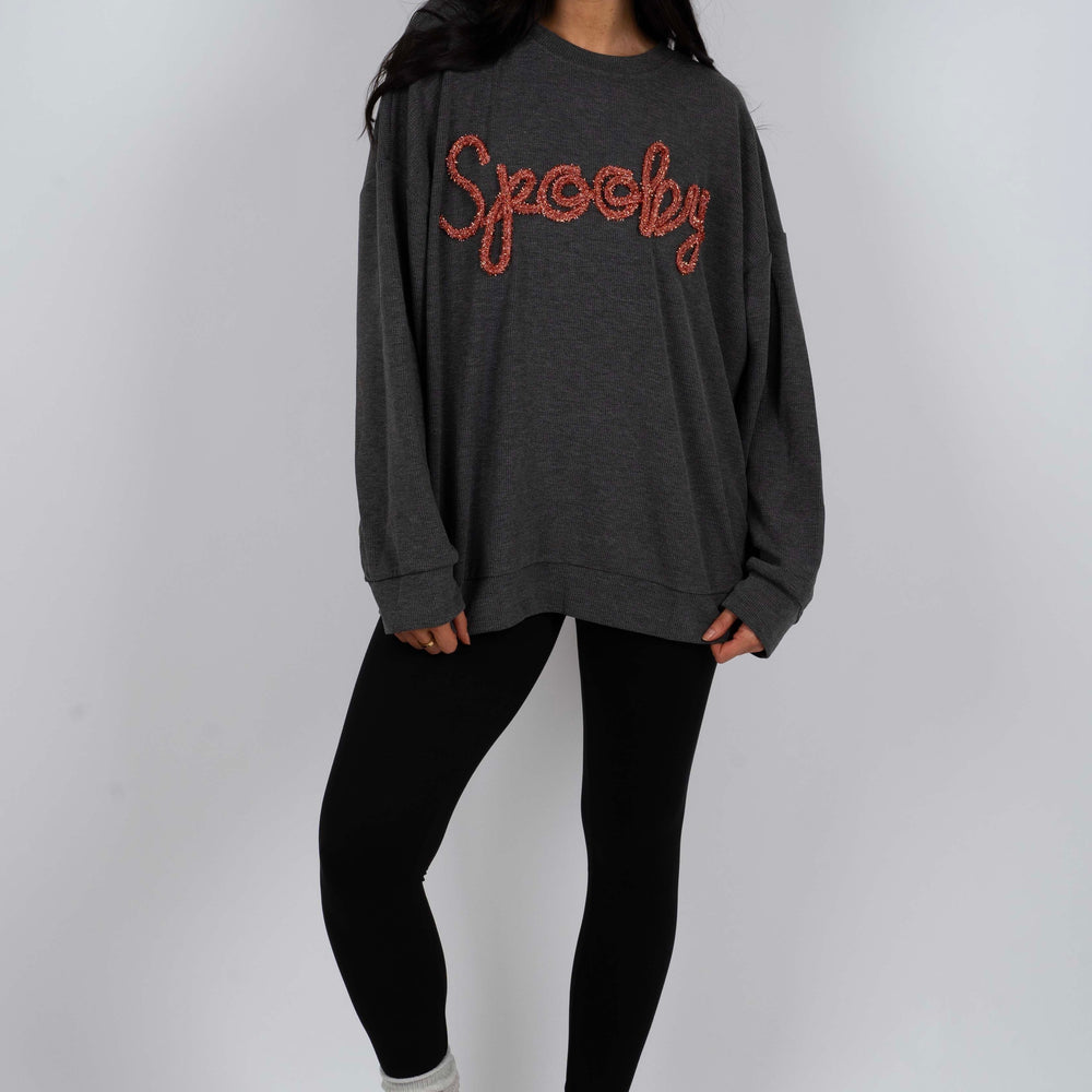 
                      
                        Spooky Tinsel Sweater
                      
                    