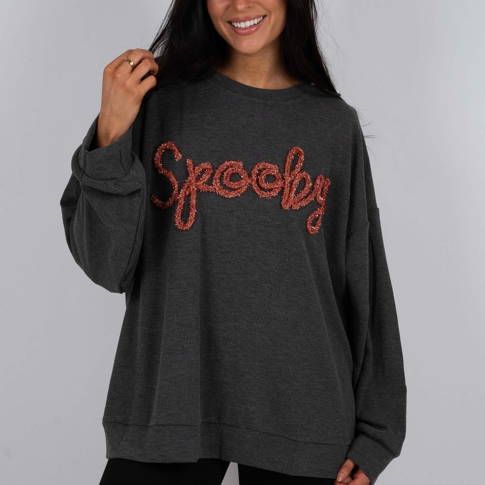 
                      
                        Spooky Tinsel Sweater
                      
                    