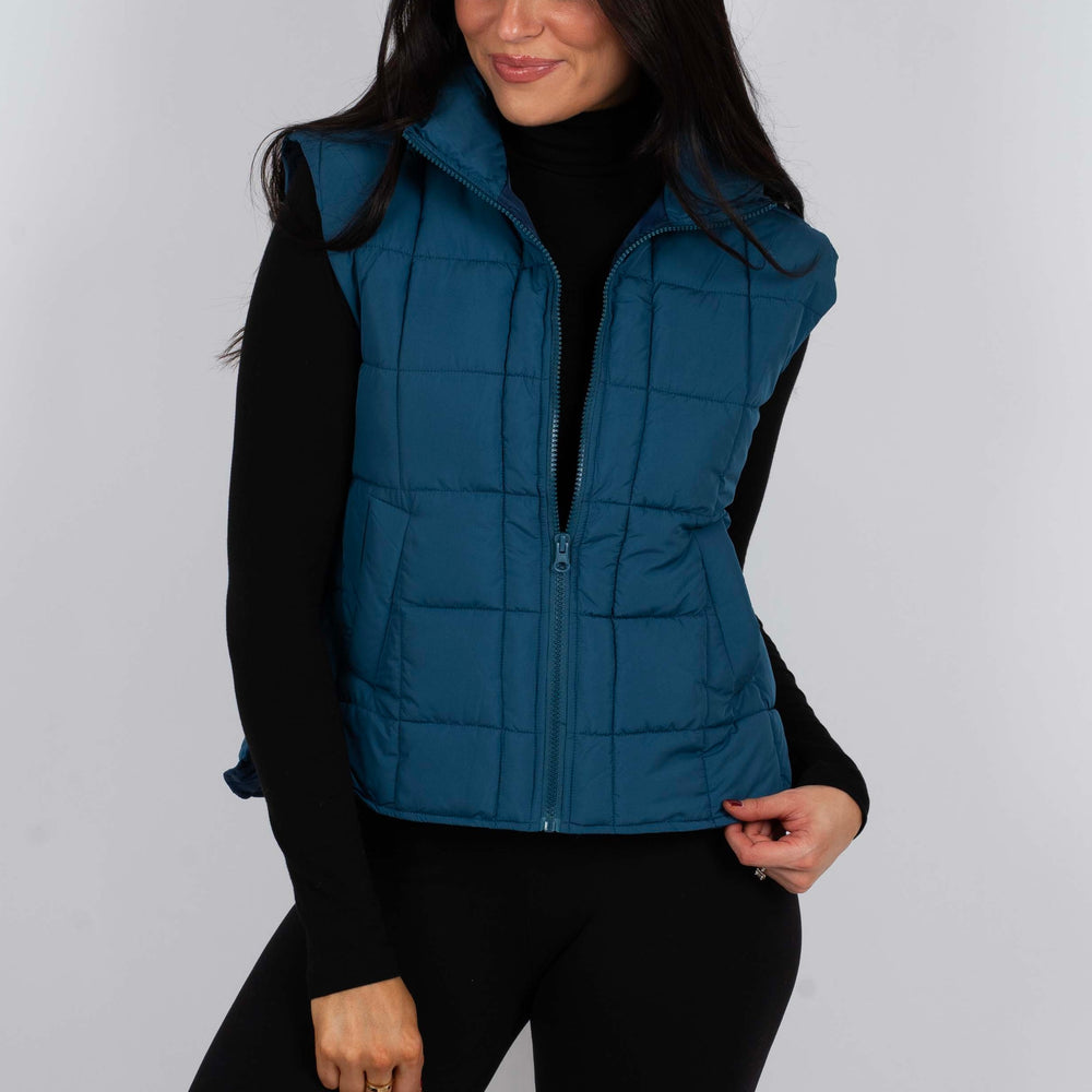 
                      
                        Hand In Hand Puffer Vest
                      
                    