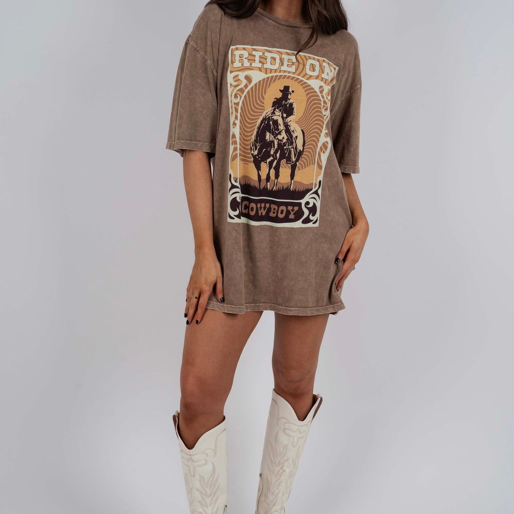 
                      
                        Ride On Cowboy Graphic Tee
                      
                    