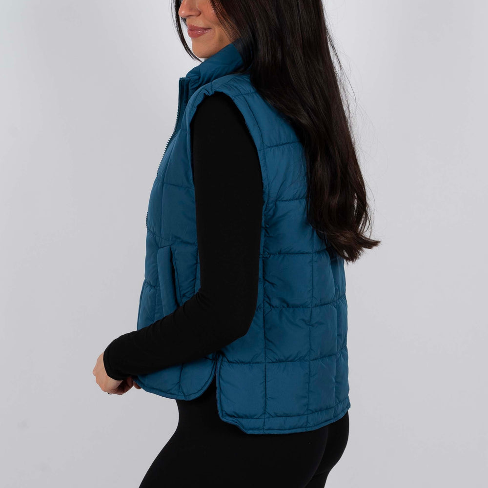 
                      
                        Hand In Hand Puffer Vest
                      
                    