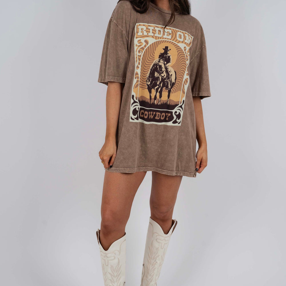 
                      
                        Ride On Cowboy Graphic Tee
                      
                    