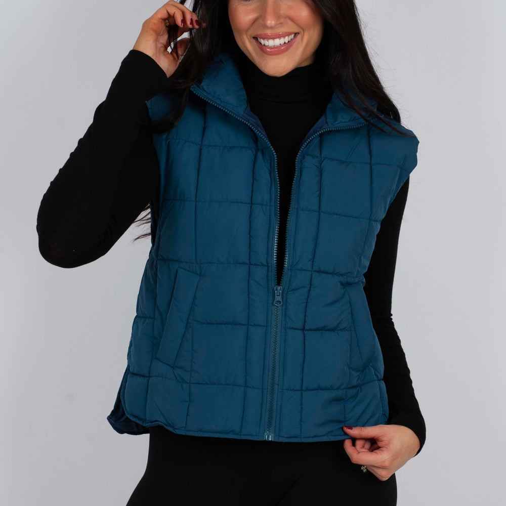 
                      
                        Hand In Hand Puffer Vest
                      
                    