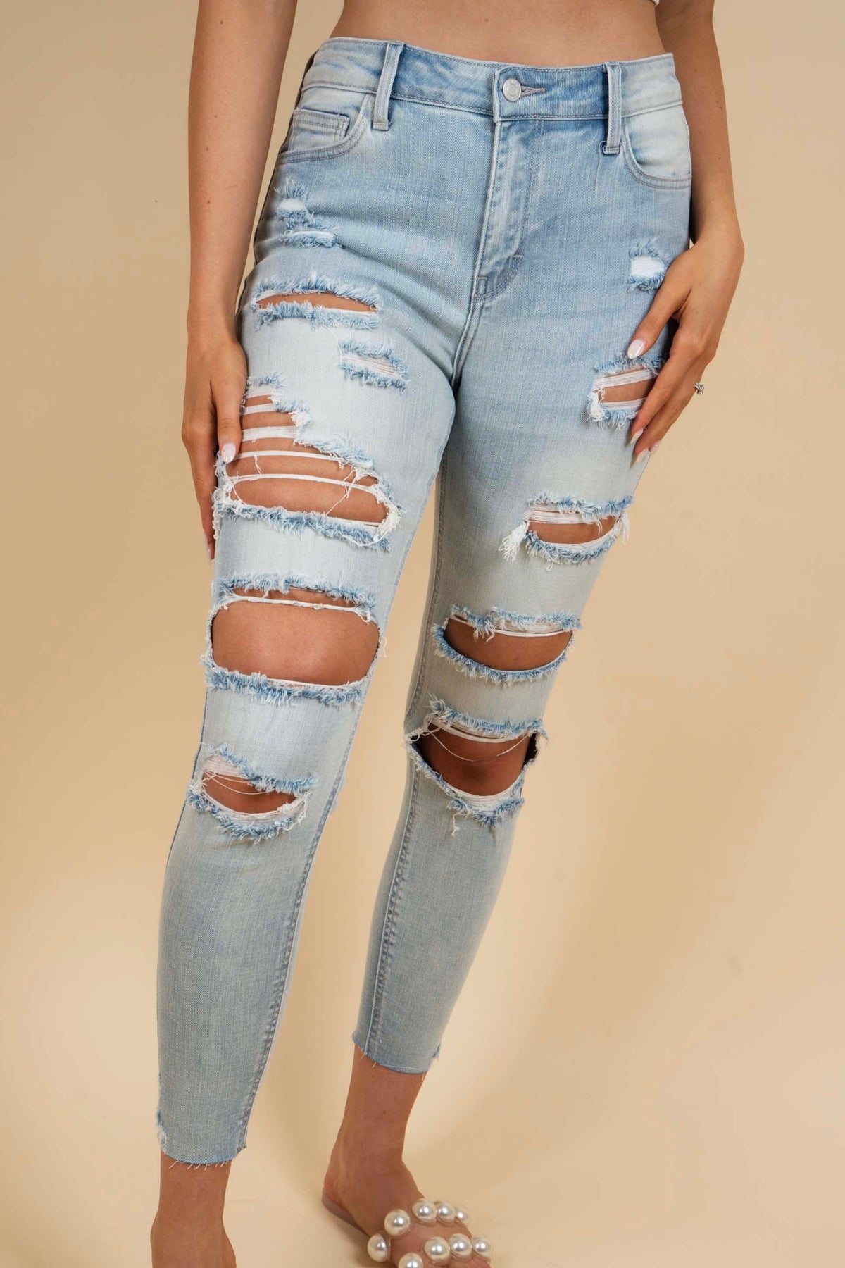 Riley Distressed Skinny Jeans